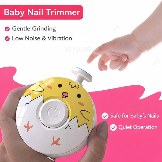 Baby nail trimmer with cartoon design held by a hand on a pink background